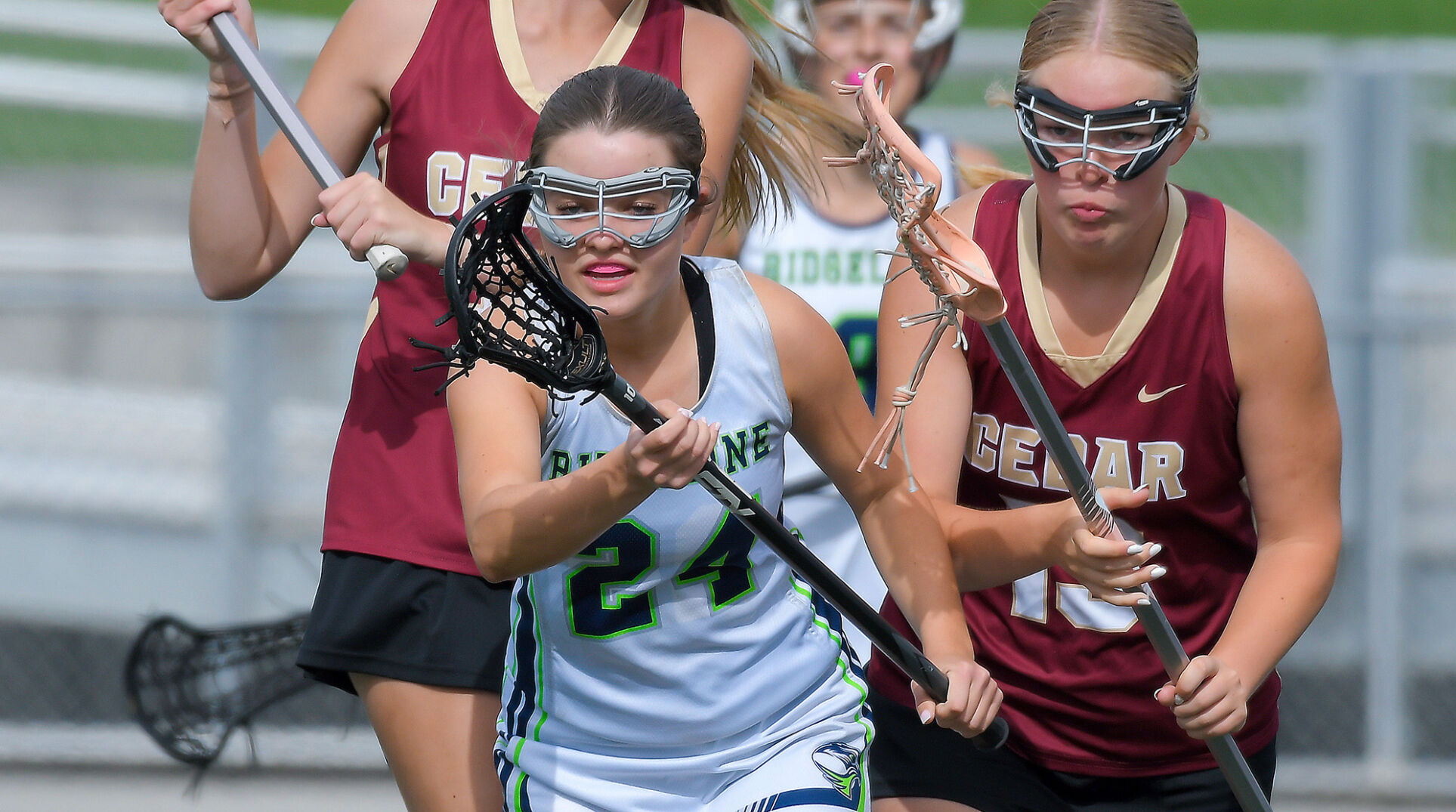 Prep girls lacrosse: Hawks blow out Reds; Cats also advance to quarterfinals
